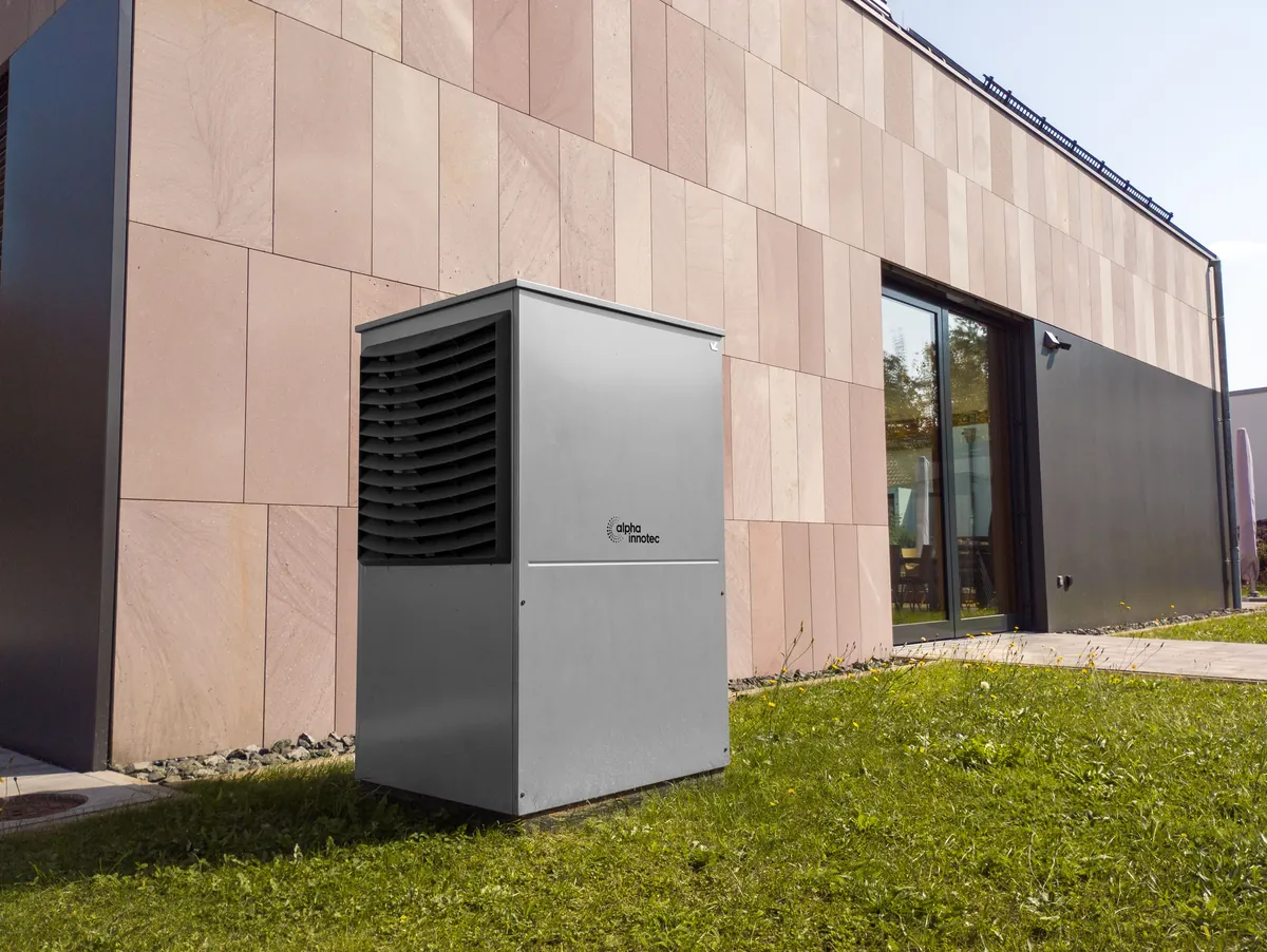 Wall-mounted renewable energy equipment installed outside a building